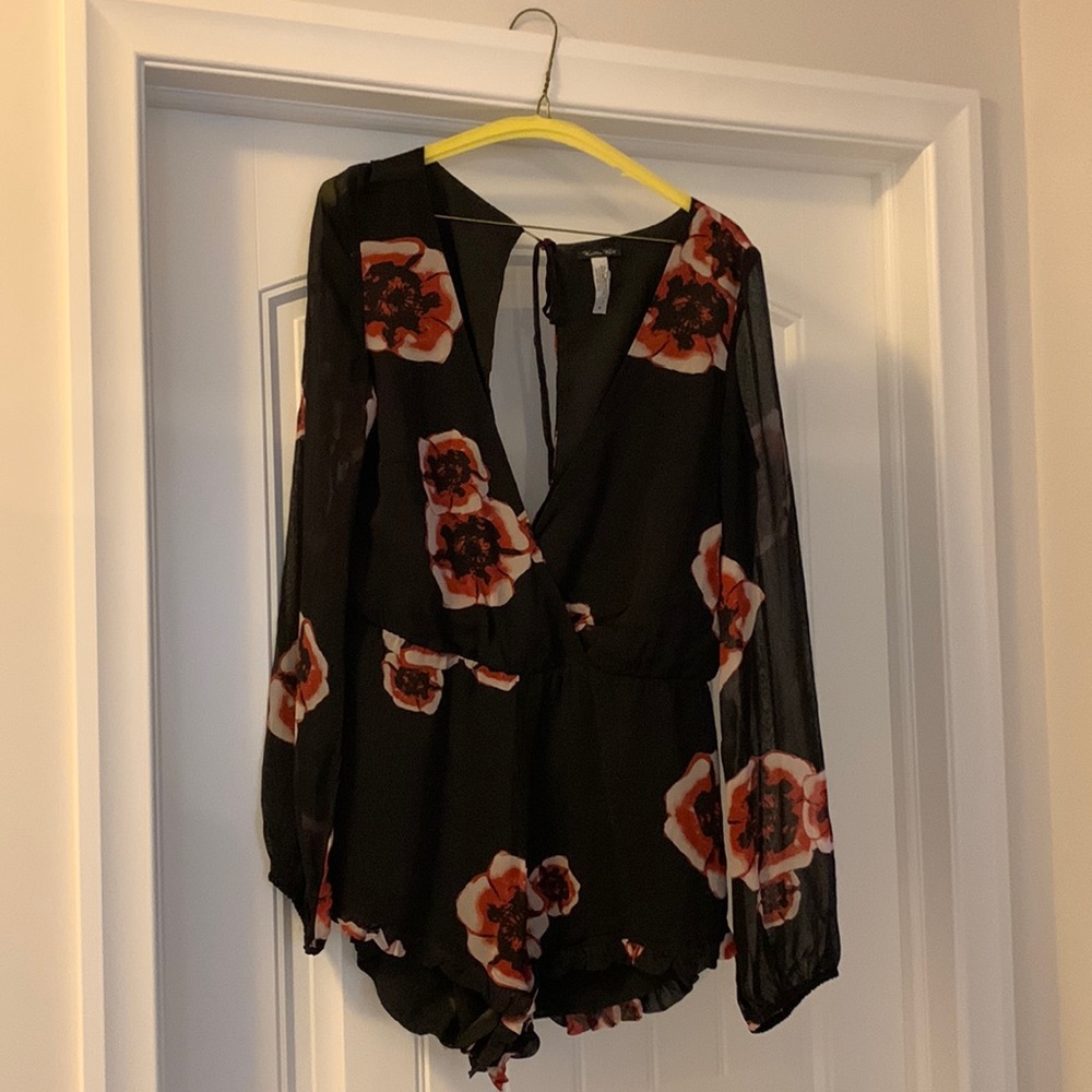 Black with flowers romper. Sheer and lined. Sexy but comfy.